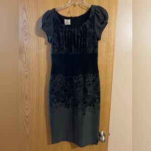 Adorable fitted gray and black dress! Only worn twice.